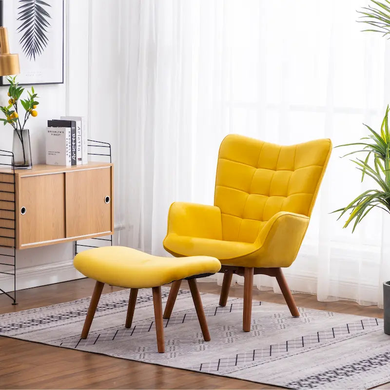 Sillón moderno amarillo de poliéster con botones capitoné y otomana con patas cónicas de madera