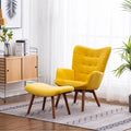 Sillón moderno amarillo de poliéster con botones capitoné y otomana con patas cónicas de madera