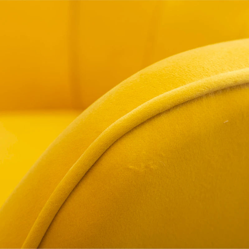 Sillón moderno amarillo de poliéster con botones capitoné y otomana con patas cónicas de madera