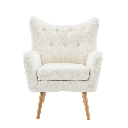 Klubowy fotel Almond Boucle z pikowanym oparciem typu wingback