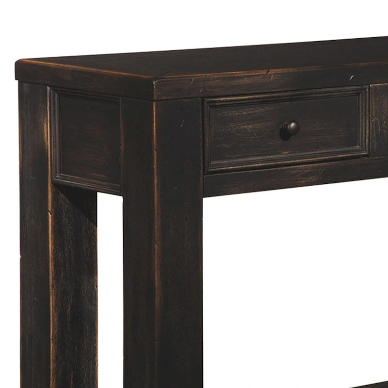 Mesa de sofá de madera con cuatro cajones y un estante, negro envejecido